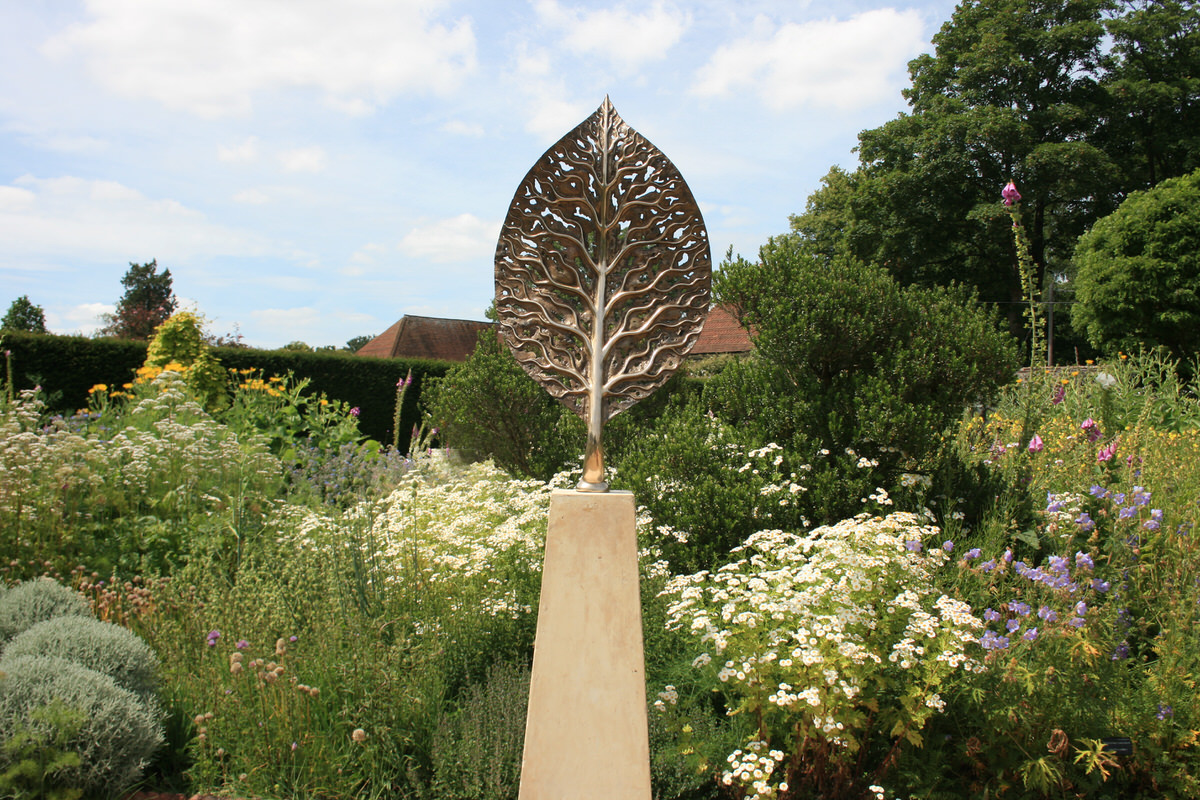 Life Leaf Sculpture Bronze Sculpture in English Cottage Garden Landscape sculpture Garden Sculpture by Mark Reed