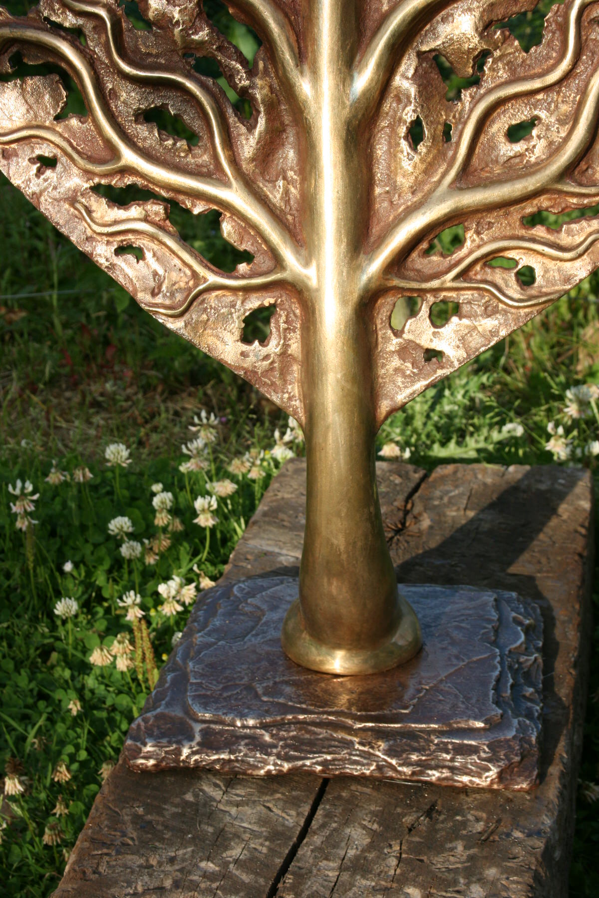 life leaf bronze sculpture with bronze slate base garden sculpture for landscape architects by Mark Reed