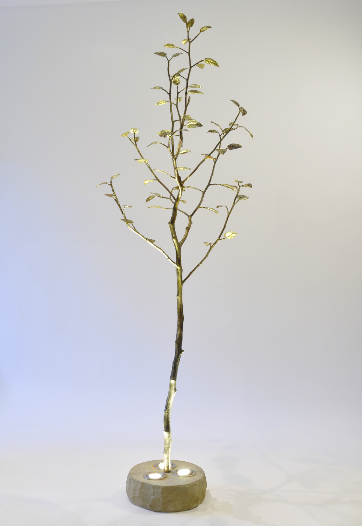 Alder Tree Sculpture with underlighting bronze sculpture interior designer lighting designer lighting indoor trees hotel design spa lighting  by Mark Reed