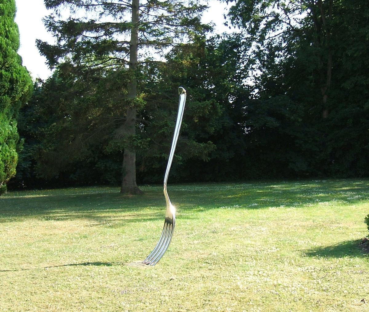 Fork sculpture stainless steel sculpture surreal sculpture monumental sculpture alternative sculpture by Mark Reed