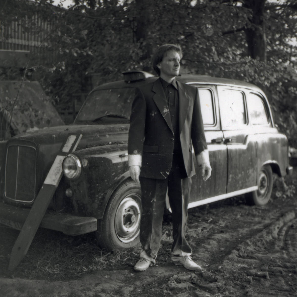 Mark Reed contemporary metal sculptor at studio in England with London Black Cab