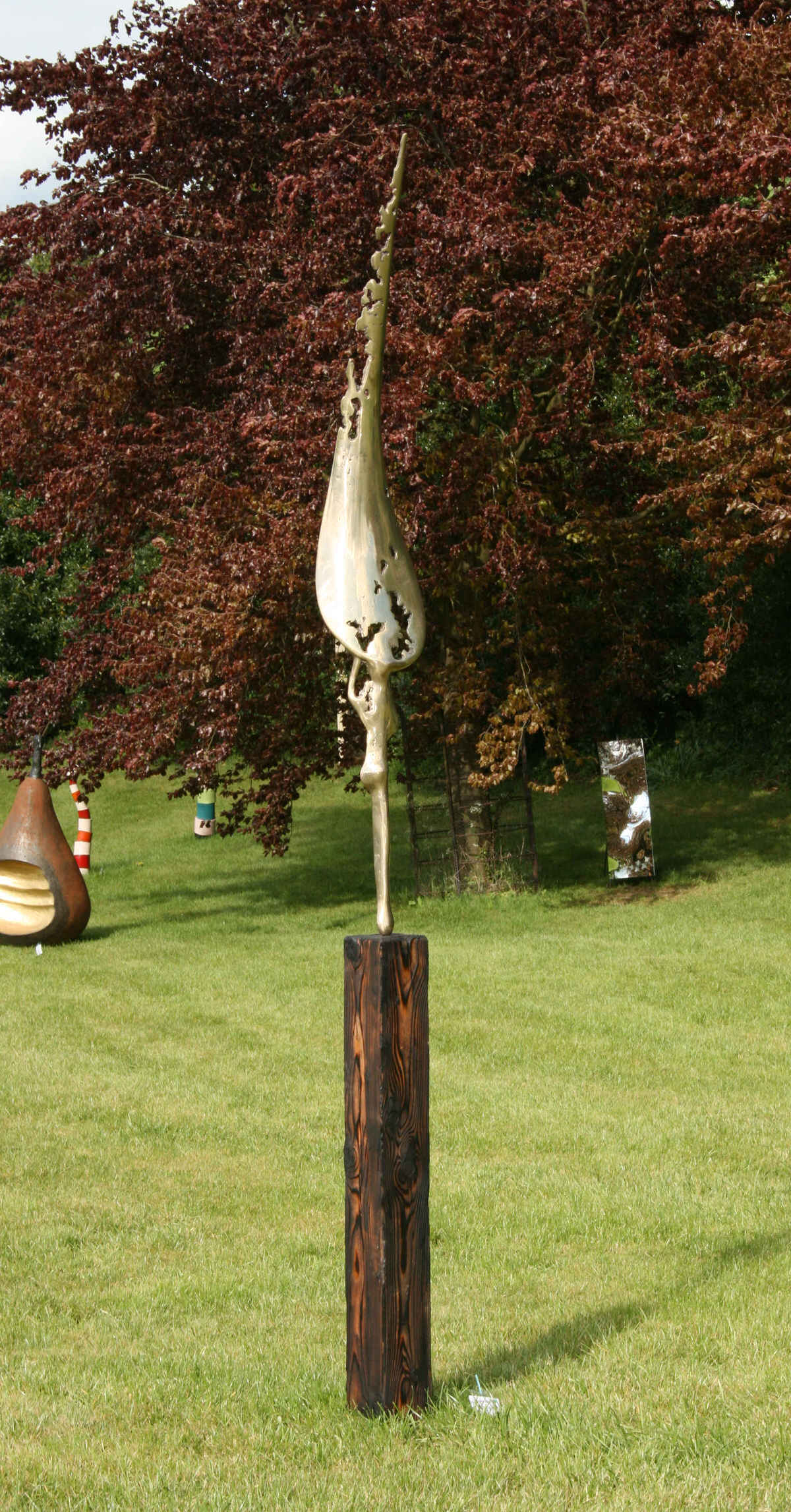 Salvation sculpture contemporary British Bronze Sculpture water feature garden sculpture wave Hill Sculpture Garden by Mark Reed