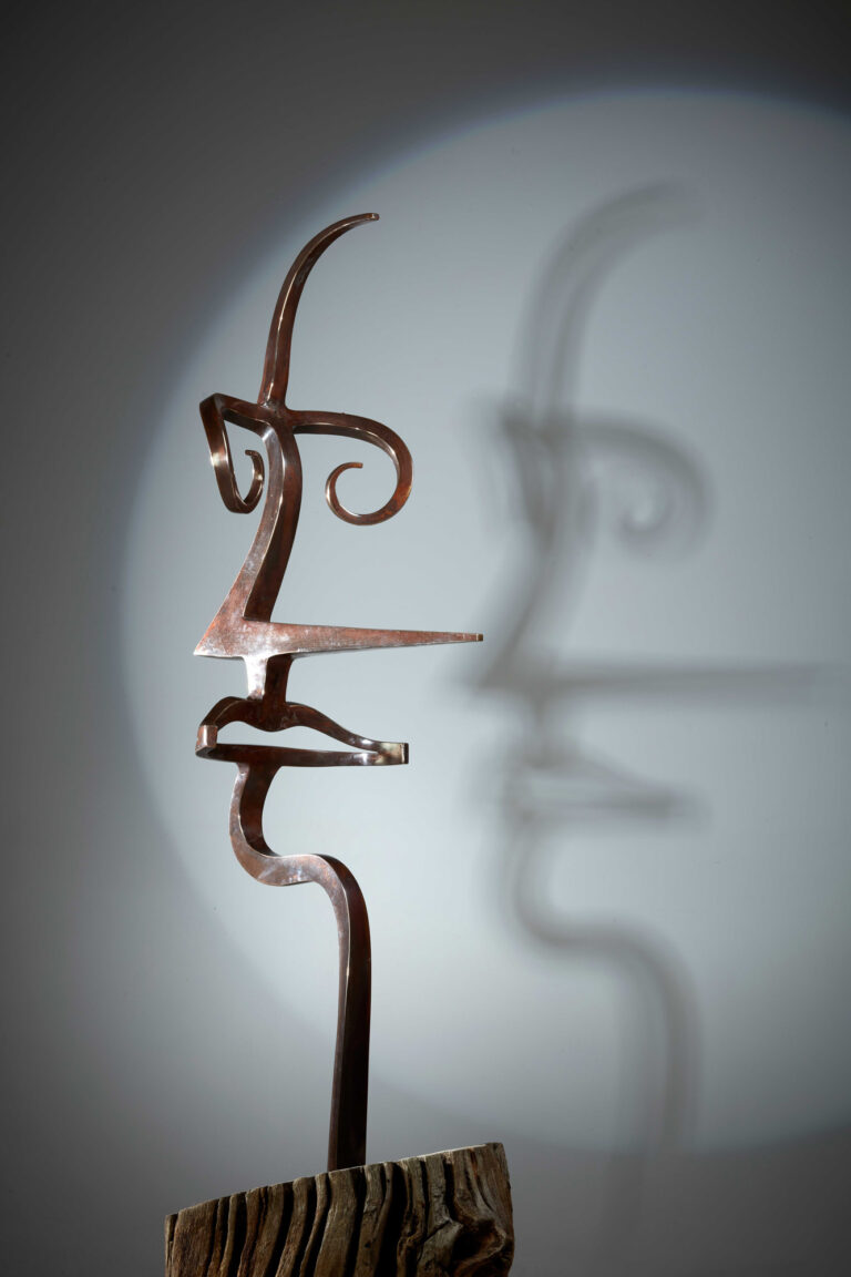 4MANbronzeindustrialsculpturefaceofmansculpturebyUKsculptor