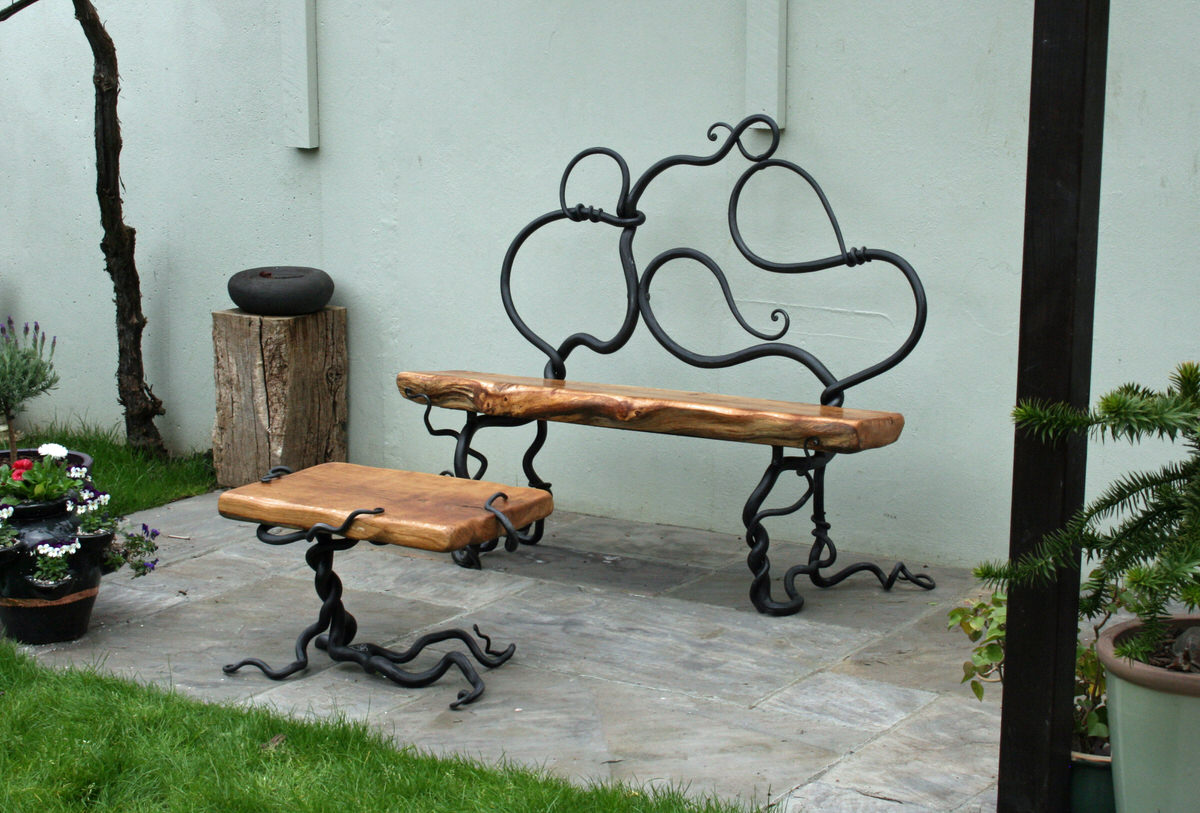 Rustic bench and table bespoke garden furniture commission forged steel and oak by sculptor Mark Reed